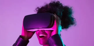 The Potential of Virtual Reality: A Journey into the Future Image of a woman putting on a Virtual Reality Goggles